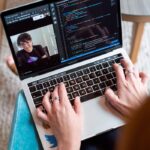 Person using Gray Laptop